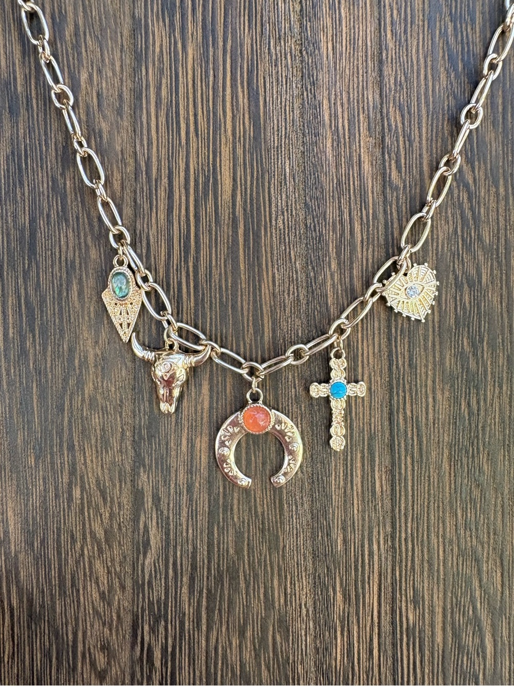 Gold-Tone Multi-Charm Necklace with Turquoise and Coral Accents